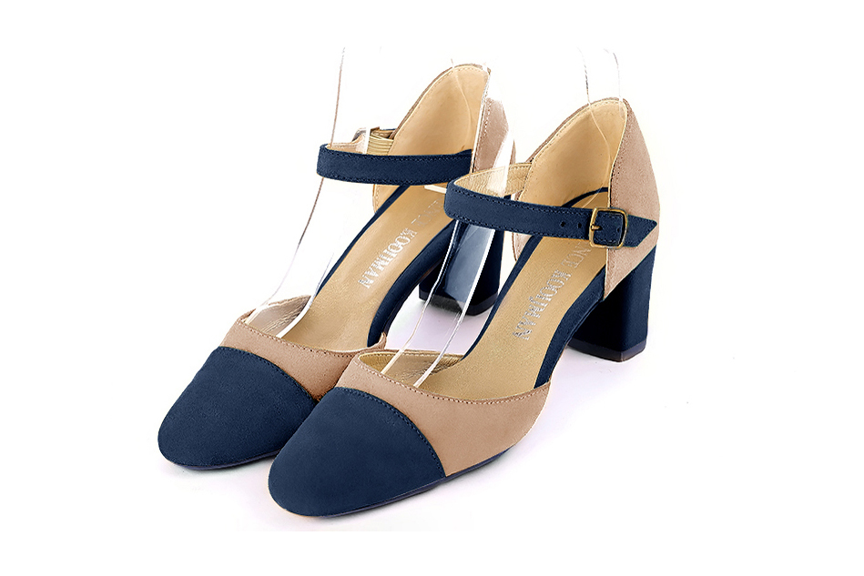 Navy blue and biscuit beige open side elegant shoes, with an instep strap. Round toe. Medium block heels.